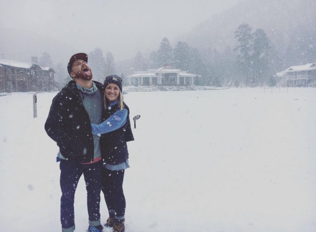 meet paige- Man and woman together in snow